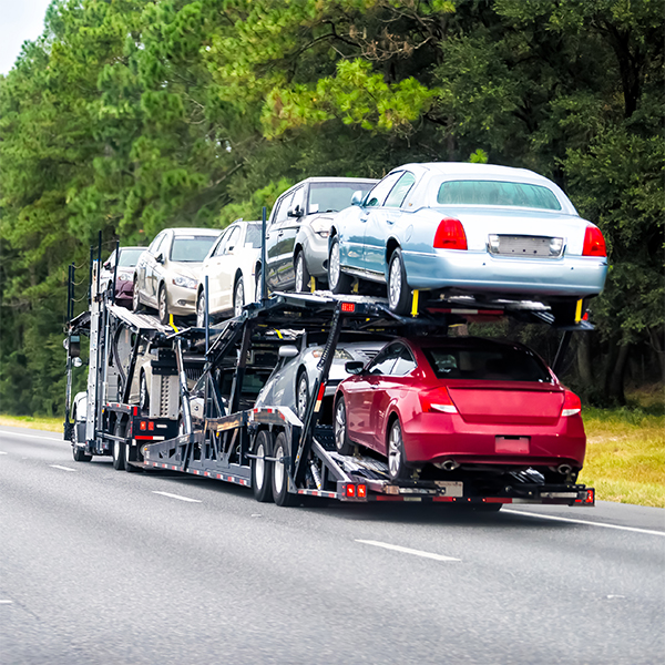 open car transport is a type of car transport service that involves transporting a vehicle on an open trailer